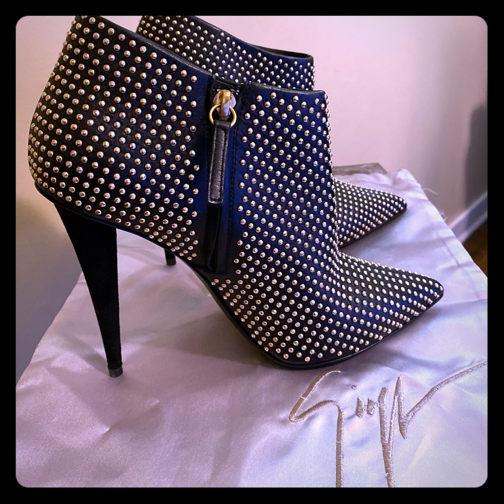 Giuseppe Zanotti black and gold ankle boots.